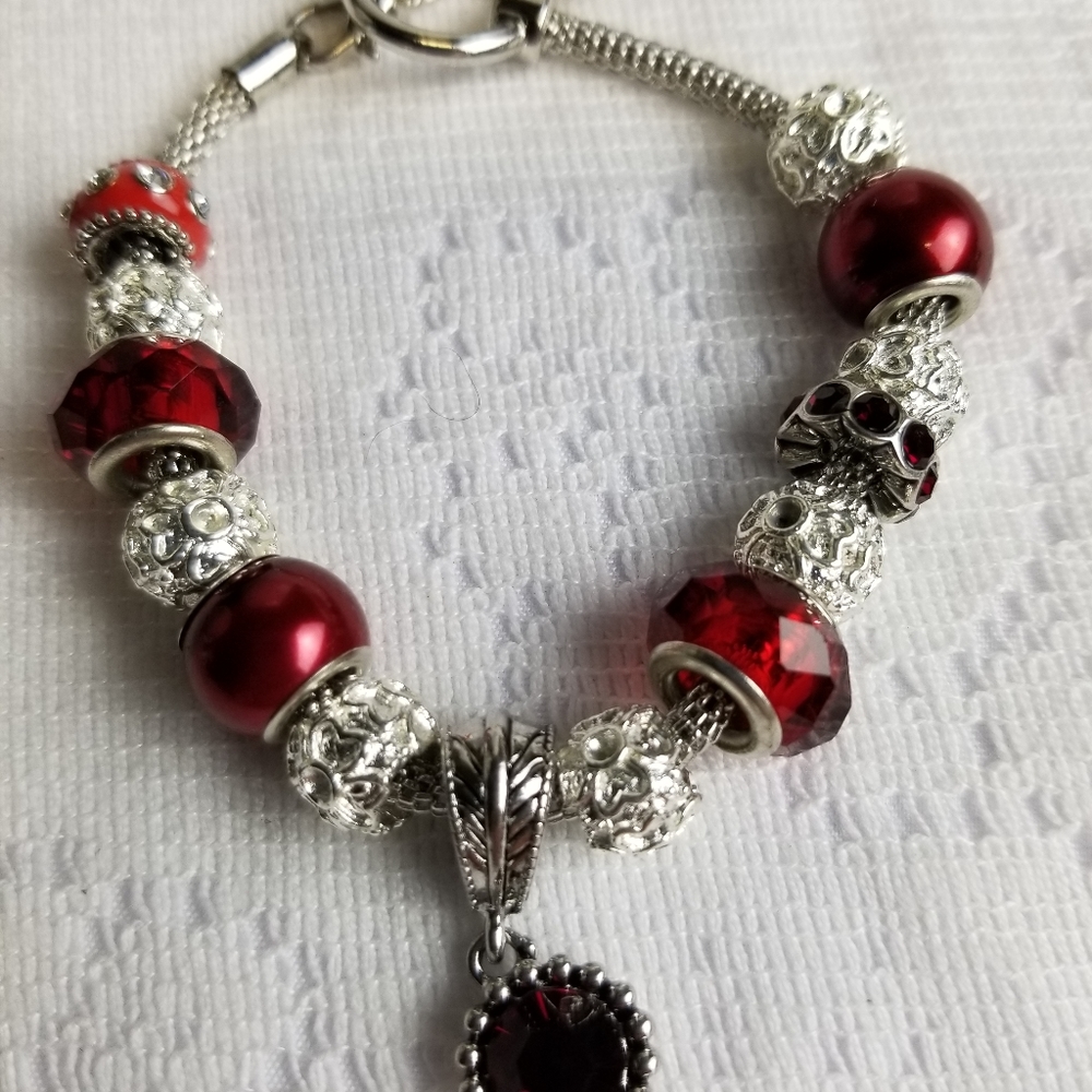 Bracelet with large hole beads red and silver.